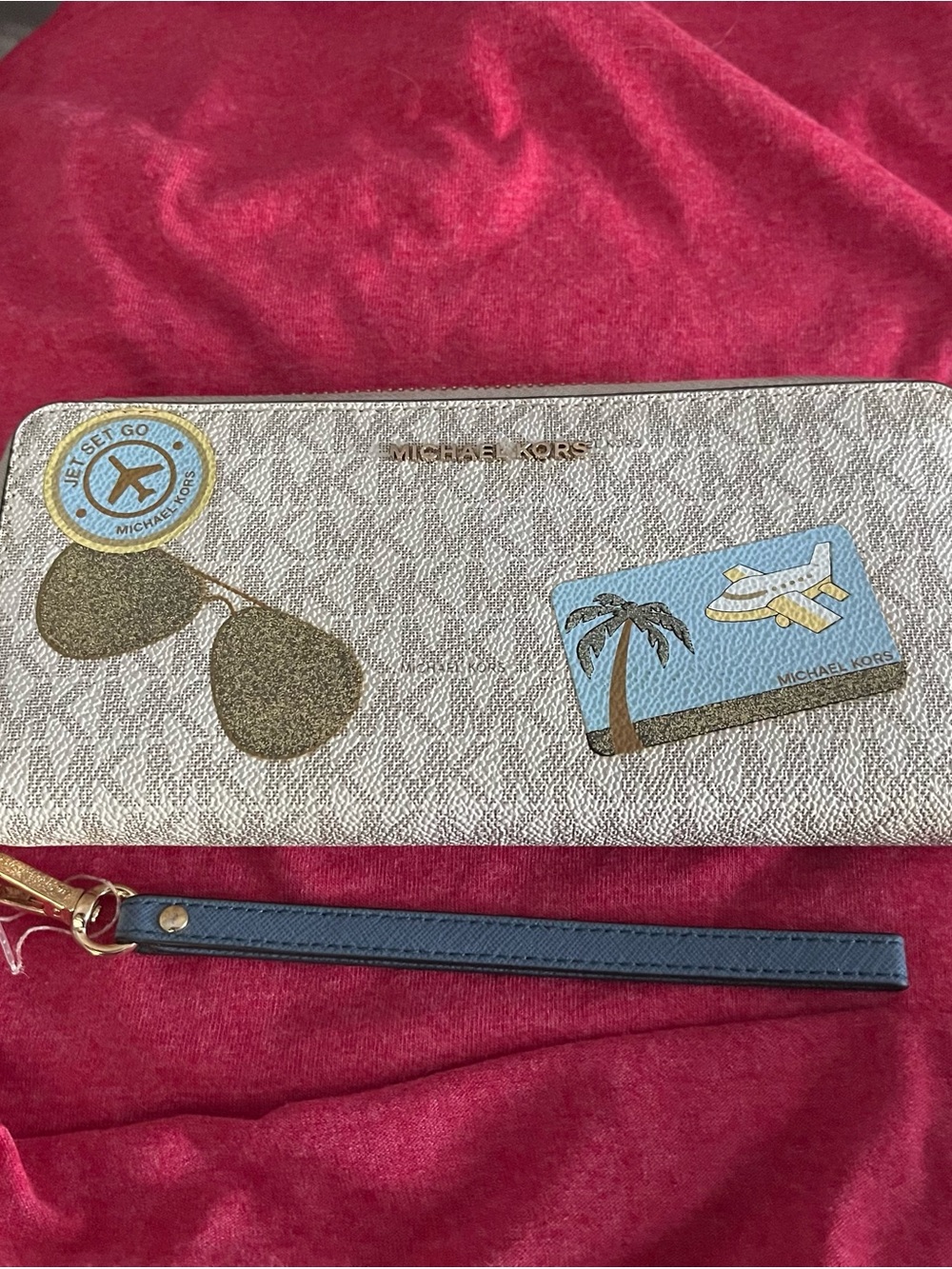 Michael Kors Metallic Gold Travel Patch Wristlet Phone Case with Blue Strap